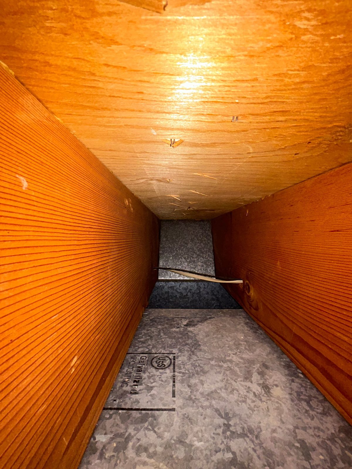 Before: Return duct — dust built up on the floor